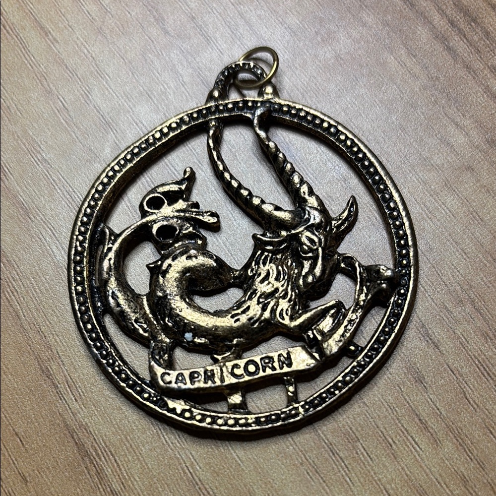 Gold tone Capricorn Zodiac Pendant
